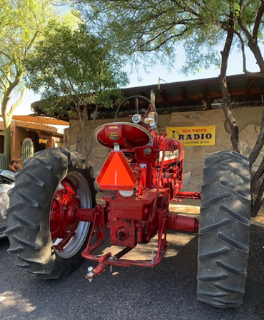 June 2 - McCormick-Deering Farmall tractor parked at Grotto Cafe.